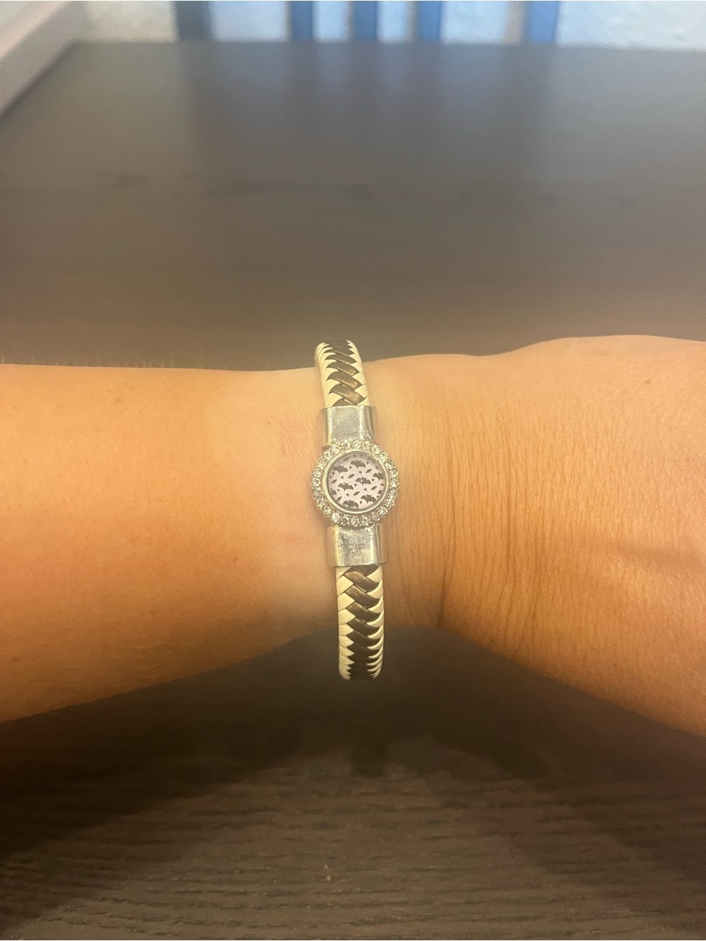 Silver-Tone Braided Snap Charm Bracelet with charms.